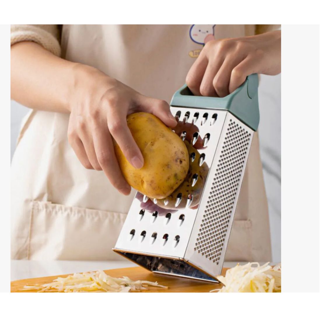 Rallador 4 caras, con mango de Polipropileno y Base antideslizante en Acero