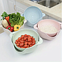 Escurridor de vegetales de plástico con bowl.